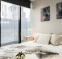 Stylish Melbourne CBD Lighthouse Apartment - Timeshare Accommodation
