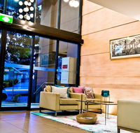 Quest Mascot - Timeshare Accommodation